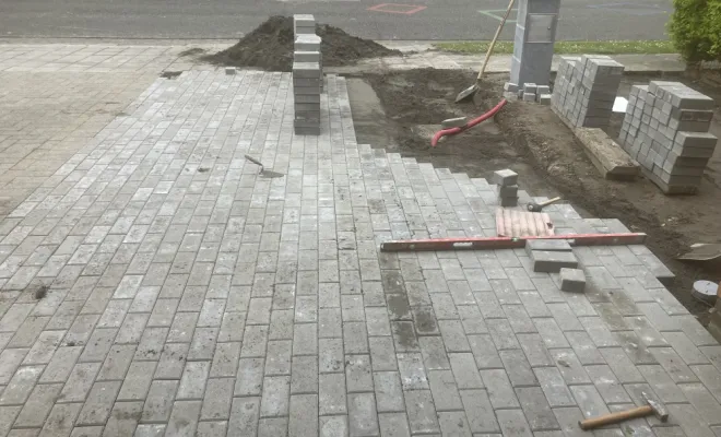 Réalisation d'une cour en pavés à Furnes, Dunkerque, Familly Rénovation